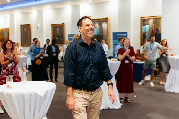 Dan Davis walking up to receive his Award
